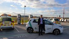 Heathrow’s chief executive John Holland-Kaye with the airport's 50th electric vehicle